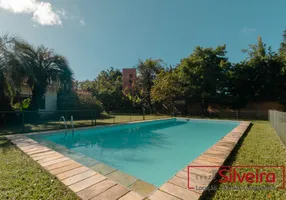 Foto 1 de Casa com 4 Quartos para alugar, 401m² em Três Figueiras, Porto Alegre