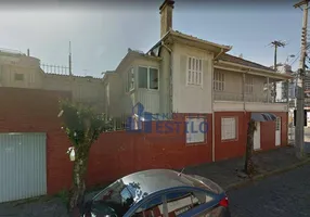 Foto 1 de Casa com 5 Quartos à venda, 180m² em Centro, Caxias do Sul