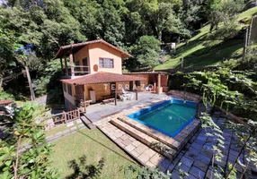 Foto 1 de Casa de Condomínio com 4 Quartos à venda, 150m² em Caneca Fina, Guapimirim
