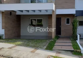 Foto 1 de Casa de Condomínio com 3 Quartos à venda, 197m² em Vila Nova, Porto Alegre