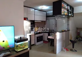 Foto 1 de Casa com 3 Quartos à venda, 219m² em Segismundo Pereira, Uberlândia