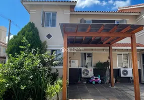 Foto 1 de Casa de Condomínio com 3 Quartos à venda, 116m² em Rubem Berta, Porto Alegre