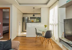 Foto 1 de Apartamento com 2 Quartos à venda, 40m² em Vila Nova, Porto Alegre