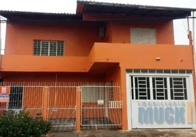 Foto 1 de Casa com 4 Quartos à venda, 200m² em Guajuviras, Canoas