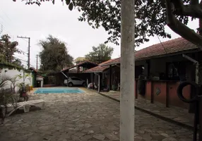 Foto 1 de Casa com 5 Quartos à venda, 400m² em Vila Horizonte, Mogi das Cruzes