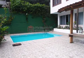 Foto 1 de Casa com 4 Quartos à venda, 382m² em Laranjeiras, Rio de Janeiro