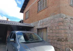 Foto 1 de Casa com 3 Quartos à venda, 143m² em Vila Nova, Porto Alegre