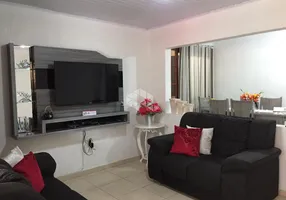 Foto 1 de Casa com 3 Quartos à venda, 128m² em Farrapos, Porto Alegre