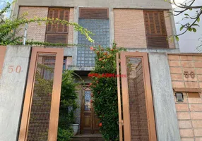 Foto 1 de Sobrado com 4 Quartos para venda ou aluguel, 456m² em Jardim da Glória, São Paulo