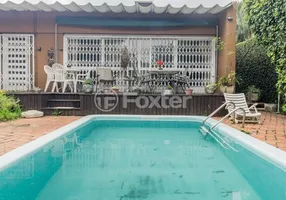 Foto 1 de Casa com 6 Quartos à venda, 255m² em Pedra Redonda, Porto Alegre