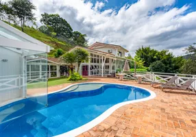 Foto 1 de Casa de Condomínio com 4 Quartos à venda, 420m² em Nogueira, Petrópolis