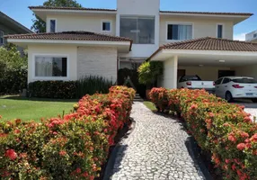Foto 1 de Casa de Condomínio com 5 Quartos à venda, 350m² em Busca-Vida, Camaçari