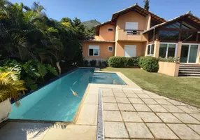 Foto 1 de Casa de Condomínio com 4 Quartos à venda, 270m² em Nogueira, Petrópolis