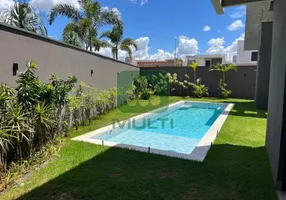 Foto 1 de Casa de Condomínio com 4 Quartos à venda, 353m² em Jardim das Palmeiras, Uberlândia