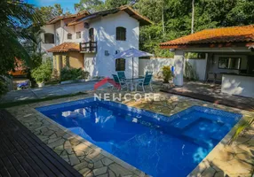 Foto 1 de Casa de Condomínio com 4 Quartos à venda, 255m² em Verde Mar, Caraguatatuba
