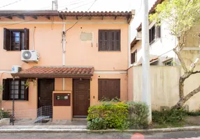 Foto 1 de Casa de Condomínio com 2 Quartos para alugar, 61m² em Vila Nova, Porto Alegre