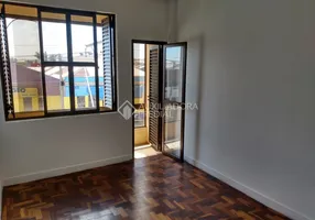 Foto 1 de Apartamento com 3 Quartos à venda, 90m² em Navegantes, Porto Alegre