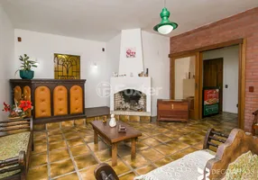 Foto 1 de Casa com 4 Quartos à venda, 242m² em Tristeza, Porto Alegre