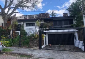 Foto 1 de Casa com 4 Quartos à venda, 360m² em Três Figueiras, Porto Alegre