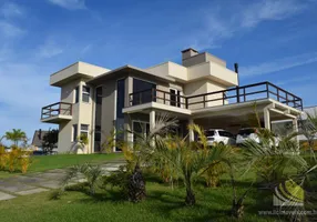 Foto 1 de Casa com 5 Quartos à venda, 246m² em Ibiraquera, Imbituba