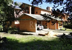 Foto 1 de Casa de Condomínio com 3 Quartos à venda, 479m² em Elsa, Viamão
