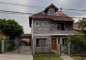 Foto 1 de Casa de Condomínio com 4 Quartos à venda, 360m² em Condominio Cantegril, Viamão