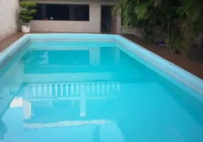 Foto 1 de Casa com 2 Quartos à venda, 200m² em Areia Branca, Santos