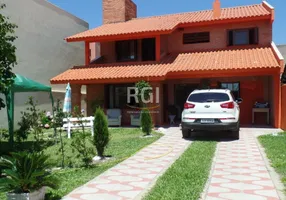 Foto 1 de Casa com 3 Quartos à venda, 181m² em Zona Nova, Tramandaí