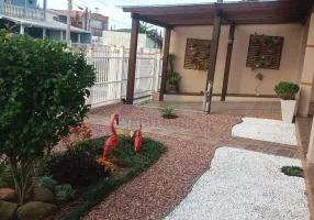 Foto 1 de Casa com 5 Quartos à venda, 180m² em Praia da Cal, Torres