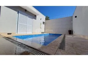 Foto 1 de Casa com 3 Quartos à venda, 145m² em Alto Umuarama, Uberlândia