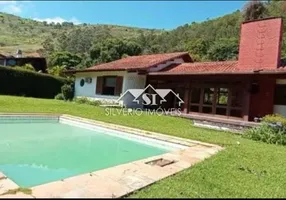 Foto 1 de Casa de Condomínio com 4 Quartos à venda, 400m² em Correas, Petrópolis