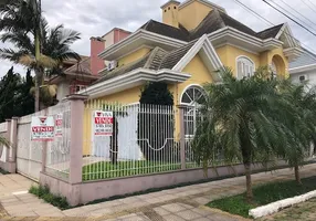 Foto 1 de Sobrado com 4 Quartos à venda, 398m² em Marechal Rondon, Canoas