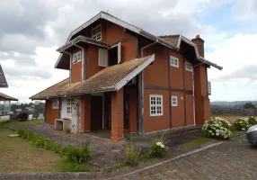 Foto 1 de Casa de Condomínio com 4 Quartos à venda, 250m² em Atalaia, Campos do Jordão