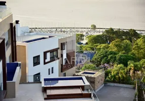 Foto 1 de Casa de Condomínio com 3 Quartos à venda, 346m² em Vila Assunção, Porto Alegre