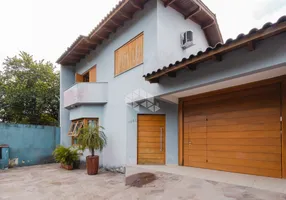 Foto 1 de Casa com 3 Quartos à venda, 135m² em Jardim Itú Sabará, Porto Alegre