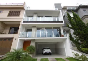 Foto 1 de Casa de Condomínio com 3 Quartos à venda, 284m² em Vila Nova, Porto Alegre