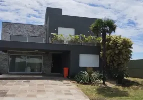 Foto 1 de Casa de Condomínio com 4 Quartos à venda, 199m² em Xangri la, Xangri-lá