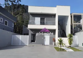 Foto 1 de Casa de Condomínio com 3 Quartos à venda, 230m² em Mar Verde II, Caraguatatuba