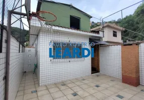 Foto 1 de Casa com 4 Quartos à venda, 156m² em Morro Nova Cintra, Santos