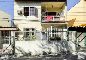 Foto 1 de Casa com 2 Quartos à venda, 68m² em Vila Nova, Porto Alegre