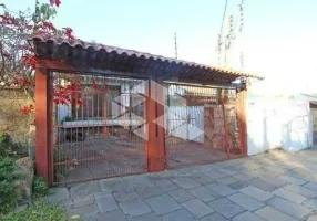 Foto 1 de Casa com 4 Quartos à venda, 151m² em Medianeira, Porto Alegre