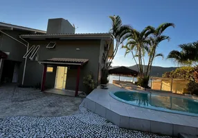 Foto 1 de Casa com 4 Quartos para alugar, 250m² em Lagoa da Conceição, Florianópolis