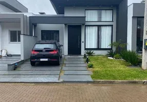 Foto 1 de Casa de Condomínio com 3 Quartos à venda, 86m² em Cocão, Viamão