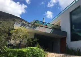 Foto 1 de Casa de Condomínio com 4 Quartos para venda ou aluguel, 480m² em Condominio Quintas do Sol, Nova Lima