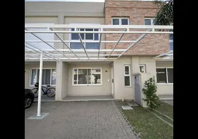 Foto 1 de Casa de Condomínio com 3 Quartos à venda, 120m² em Vila Nova, Porto Alegre