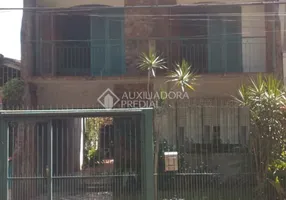 Foto 1 de Casa com 4 Quartos à venda, 192m² em Passo da Areia, Porto Alegre