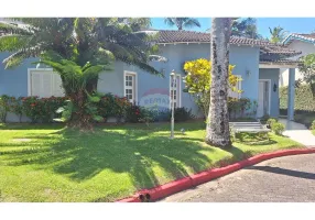 Foto 1 de Casa de Condomínio com 3 Quartos à venda, 213m² em Balneário Praia do Pernambuco, Guarujá