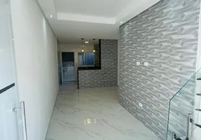 Foto 1 de Sobrado com 2 Quartos à venda, 61m² em Maracanã, Praia Grande