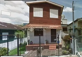 Foto 1 de Casa com 5 Quartos à venda, 180m² em Cavalhada, Porto Alegre
