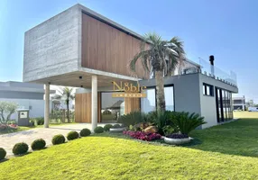 Foto 1 de Casa de Condomínio com 4 Quartos à venda, 459m² em Itapeva, Torres